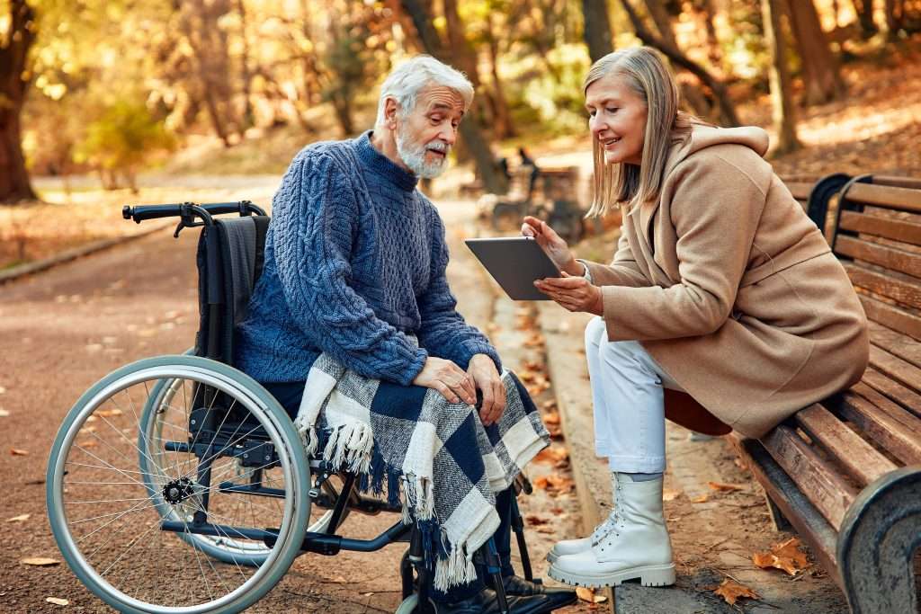 senior-couple-walking-in-the-park-in-autumn-2024-01-23-00-26-28-utc (1)-min